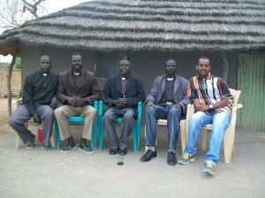 Joseph and I (extreme left & extreme right) with pastors from Agany